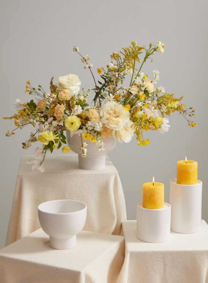 white washed tin vase with white flowers