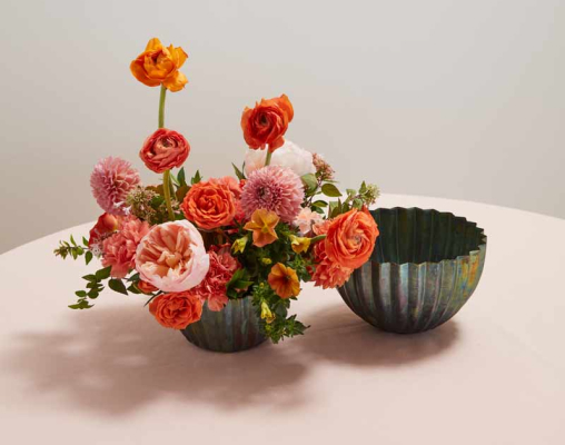 Orange and Pink Flowers in beautiful green metal bowl