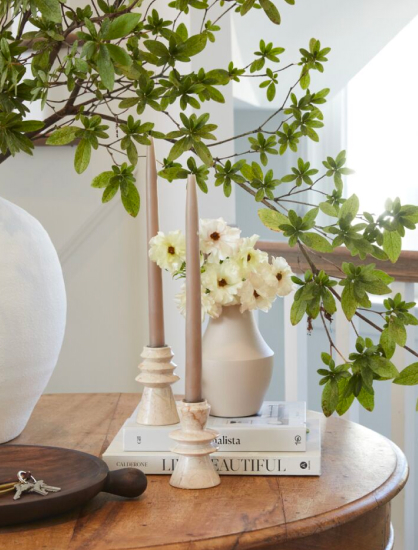 candle holders on a entry table