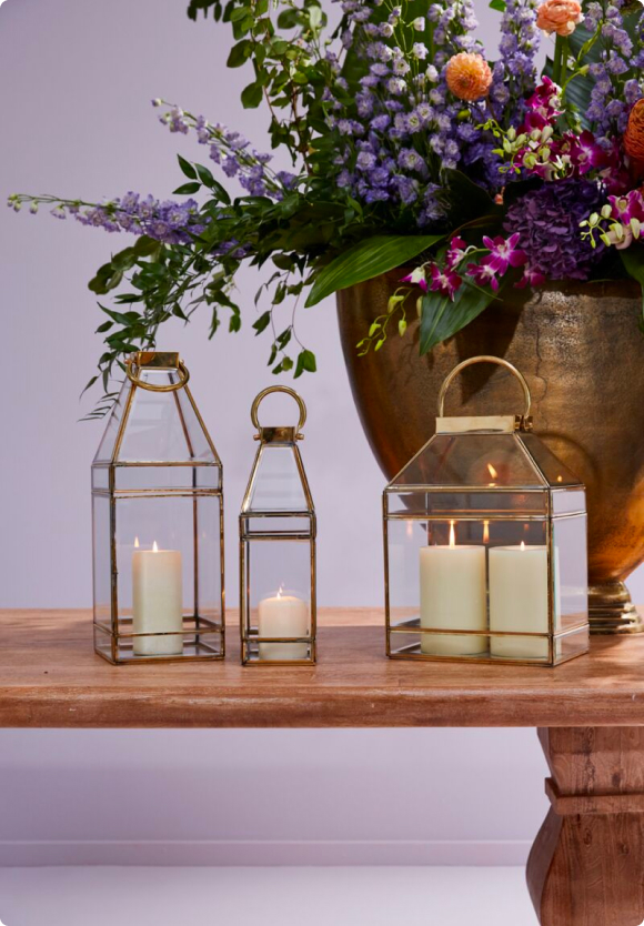 glass gold rimmed lanterns in various sizes