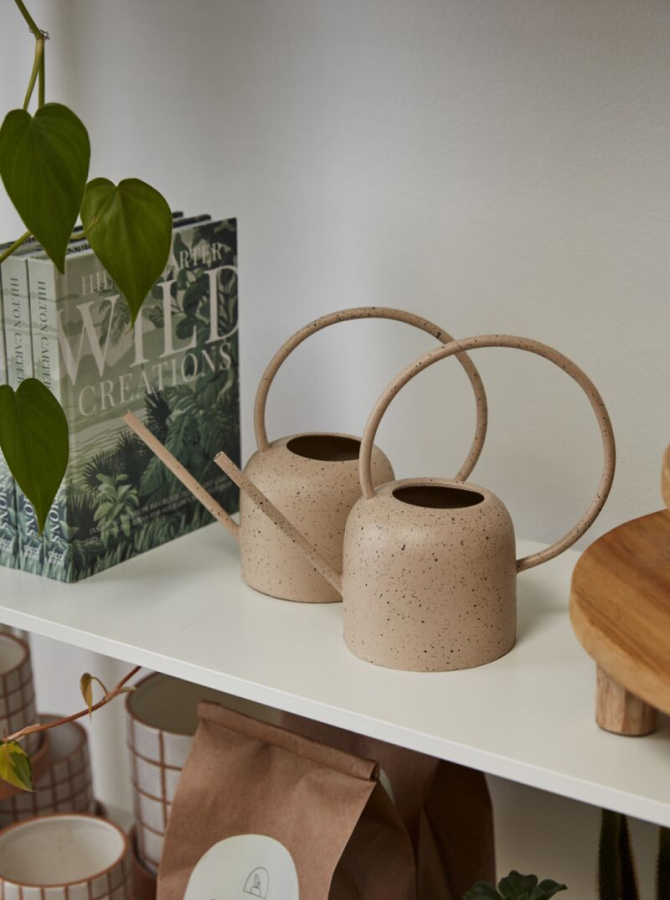terracotta looking watering cans