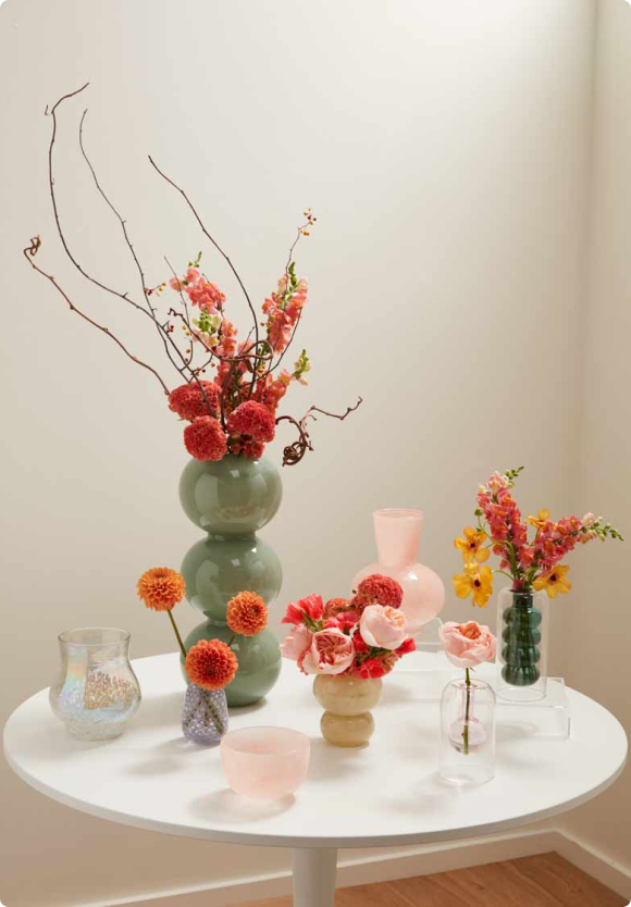 assortment of accent decor vases